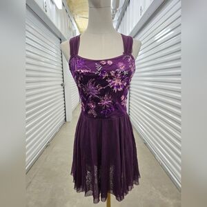 Purple dance costume or figure skating dress